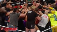 The Undertaker and Brock Lesnar brawling